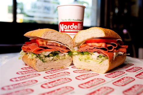 Nardelli's grinder shoppe - Comes on your choice of wrap - whole wheat, sun dried tomato or spinach. Made with “everything” includes mayonnaise, lettuce, tomato, classic mix (has onions), provolone cheese, black olives & hot sauce. $8.99. Veggie Half Grinder. Includes roasted peppers, marinated mushrooms, pickles and artichoke hearts.